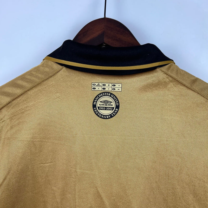 Camisa Retrô Manchester United Edição 100 Anos Masculina- Umbro Braca e preta, Dourada e Preta Dupla Face