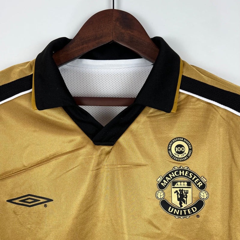 Camisa Retrô Manchester United Edição 100 Anos Masculina- Umbro Braca e preta, Dourada e Preta Dupla Face